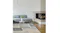 Beaumont Contempo Rug styled in a modern living room beneath a coffee table Beaumont Contempo Rug styled in a modern living room beneath a coffee table