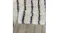 Angled close-up of the rug edge and surface, highlighting the textured pile, and curved charcoal stripe pattern Angled close-up of the rug edge and surface, highlighting the textured pile, and curved charcoal stripe pattern