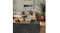 Remi Rug in Carbon styled in a modern living room beneath a timber coffee table Remi Rug in Carbon styled in a modern living room beneath a timber coffee table