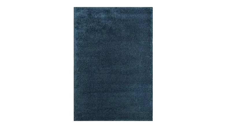 Overhead portrait view of the rug in navy, highlighting the solid deep-blue finish and luxurious pile Overhead portrait view of the rug in navy, highlighting the solid deep-blue finish and luxurious pile