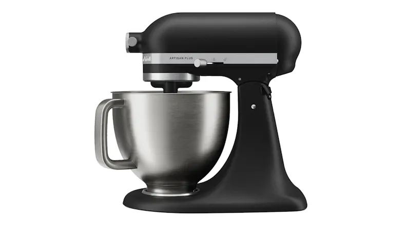 Left-side view of the KitchenAid Artisan Plus mixer with a stainless steel bowl and tilt-head design Left-side view of the KitchenAid Artisan Plus mixer with a stainless steel bowl and tilt-head design