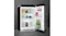Angled view of a black SMEG compact refrigerator with the door open, displaying drinks and bottle racks inside Angled view of a black SMEG compact refrigerator with the door open, displaying drinks and bottle racks inside
