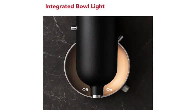 Top-down view of a black KitchenAid mixer bowl with an integrated bowl light shown in an off-and-on comparison Top-down view of a black KitchenAid mixer bowl with an integrated bowl light shown in an off-and-on comparison