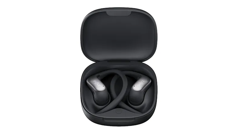 Front view of black Shokz open-ear wireless earbuds with ear hooks stored inside an open charging case Front view of black Shokz open-ear wireless earbuds with ear hooks stored inside an open charging case