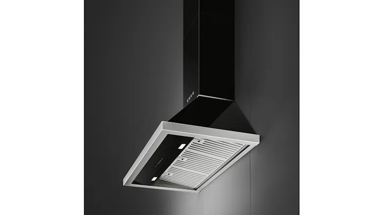 Side dynamic angle showing the underside filters and sleek chimney of the Smeg rangehood Side dynamic angle showing the underside filters and sleek chimney of the Smeg rangehood