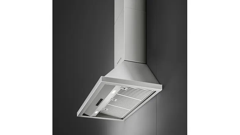 Side dynamic angle showing the underside filters and sleek chimney of the Smeg rangehood Side dynamic angle showing the underside filters and sleek chimney of the Smeg rangehood