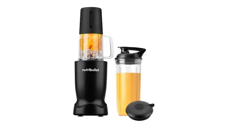 Front view of black NutriBullet Turbo Ultimate blender with orange slices in blending cup and filled travel smoothie cup Front view of black NutriBullet Turbo Ultimate blender with orange slices in blending cup and filled travel smoothie cup