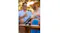 Charcoal Shark personal cooling fan emitting mist on a wooden table, with a blurred couple relaxing outdoors in the background Charcoal Shark personal cooling fan emitting mist on a wooden table, with a blurred couple relaxing outdoors in the background