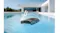 Pool cleaner operating on a residential swimming pool surface, with graphic overlays Pool cleaner operating on a residential swimming pool surface, with graphic overlays