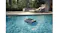 Aiper EcoSurfer S2 solar-powered robotic pool cleaner floating on a clear residential swimming pool Aiper EcoSurfer S2 solar-powered robotic pool cleaner floating on a clear residential swimming pool
