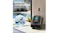 Robotic pool cleaner positioned on a wireless charging dock beside a pool Robotic pool cleaner positioned on a wireless charging dock beside a pool