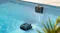 Aiper Scuba V3 approaching the pool wall for retrieval, illustrating automatic waterline parking Aiper Scuba V3 approaching the pool wall for retrieval, illustrating automatic waterline parking