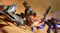 A gundam confronting a giant alien robot A gundam confronting a giant alien robot