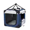 Front angle view of a blue and grey PaWz Soft Pet Transport Crate with a mesh zip door and carry straps Front angle view of a blue and grey PaWz Soft Pet Transport Crate with a mesh zip door and carry straps