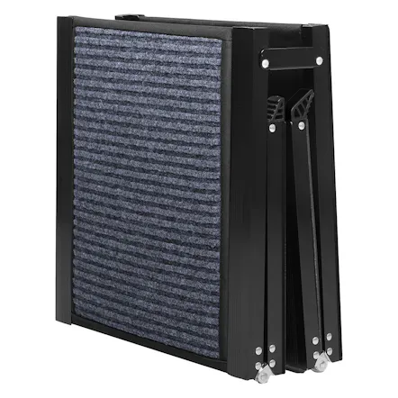 Side-angle view of a folded black pet ramp with a blue ribbed tread surface Side-angle view of a folded black pet ramp with a blue ribbed tread surface