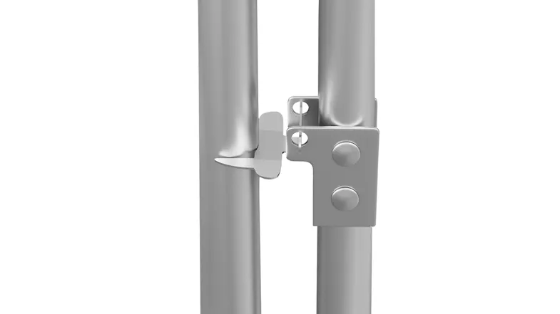 Close-up of a grey metal chicken coop door latch with a secure locking mechanism and tubular frame Close-up of a grey metal chicken coop door latch with a secure locking mechanism and tubular frame