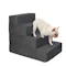 Dark grey PaWz Foam Pet Stairs featuring a dog climbing down the steps Dark grey PaWz Foam Pet Stairs featuring a dog climbing down the steps