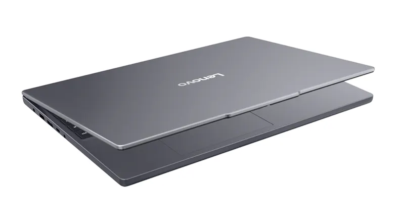 Front angled view of the closed laptop stacked slightly open, highlighting the slim lid profile Front angled view of the closed laptop stacked slightly open, highlighting the slim lid profile