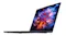 Side profile view of the laptop open, highlighting the slim chassis, display hinge and keyboard layout Side profile view of the laptop open, highlighting the slim chassis, display hinge and keyboard layout