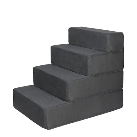 Angled front view of grey four-step foam pet stairs with a textured fabric cover Angled front view of grey four-step foam pet stairs with a textured fabric cover