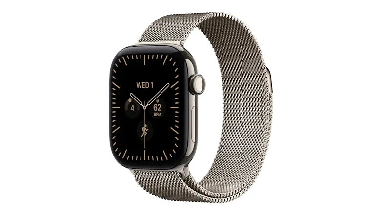 An angled view of natural titanium Apple Watch Series 12 with natural Milanese band showing digital crown and display An angled view of natural titanium Apple Watch Series 12 with natural Milanese band showing digital crown and display