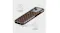 Brown polka dot phone case in angled rear view with cream dots, glossy finish, and accessible port cutouts Brown polka dot phone case in angled rear view with cream dots, glossy finish, and accessible port cutouts