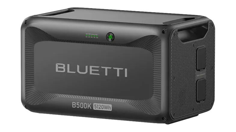 Three-quarter view of the Bluetti B500K for Apex 300, showing integrated handles and side connection ports Three-quarter view of the Bluetti B500K for Apex 300, showing integrated handles and side connection ports