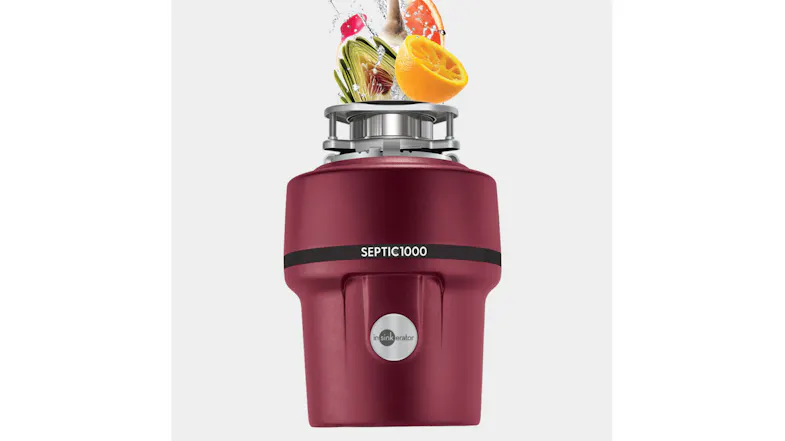 InSinkErator unit with food scraps and water splashes above InSinkErator unit with food scraps and water splashes above