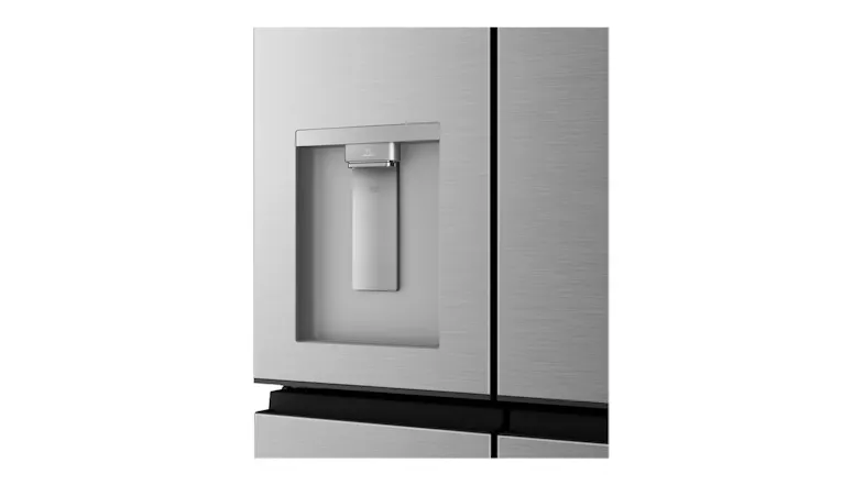 Close-up front view of a silver refrigerator water dispenser integrated into the French door panel Close-up front view of a silver refrigerator water dispenser integrated into the French door panel