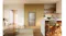 Front view of a silver Haier refrigerator with a water dispenser in a modern kitchen setting Front view of a silver Haier refrigerator with a water dispenser in a modern kitchen setting