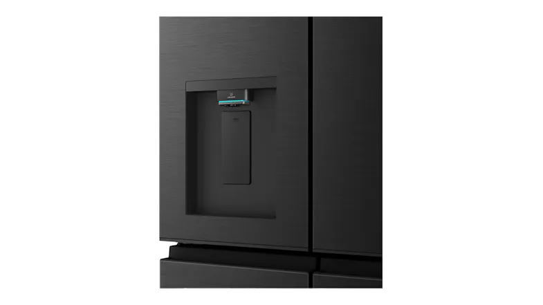 Close-up front view of a black refrigerator water dispenser integrated into a brushed metal French door panel Close-up front view of a black refrigerator water dispenser integrated into a brushed metal French door panel