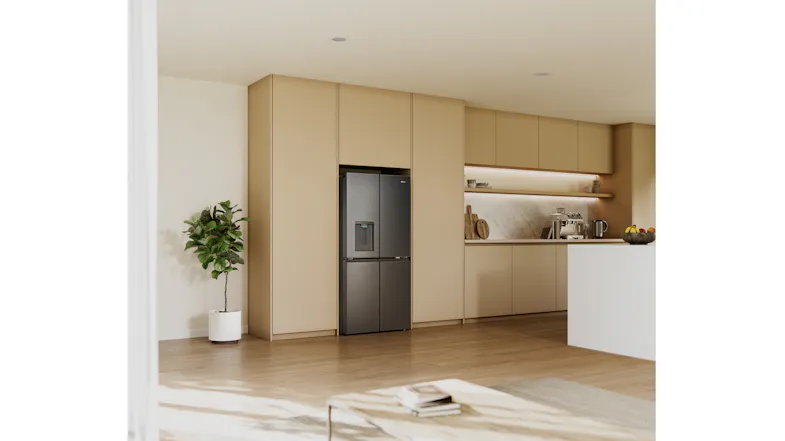 Wide-angle kitchen view featuring a black four-door refrigerator integrated into beige cabinetry Wide-angle kitchen view featuring a black four-door refrigerator integrated into beige cabinetry
