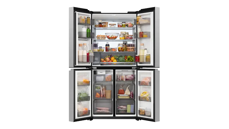 Silver Haier refrigerator with open doors, filled with fresh ingredients, drinks, and freezer storage items Silver Haier refrigerator with open doors, filled with fresh ingredients, drinks, and freezer storage items