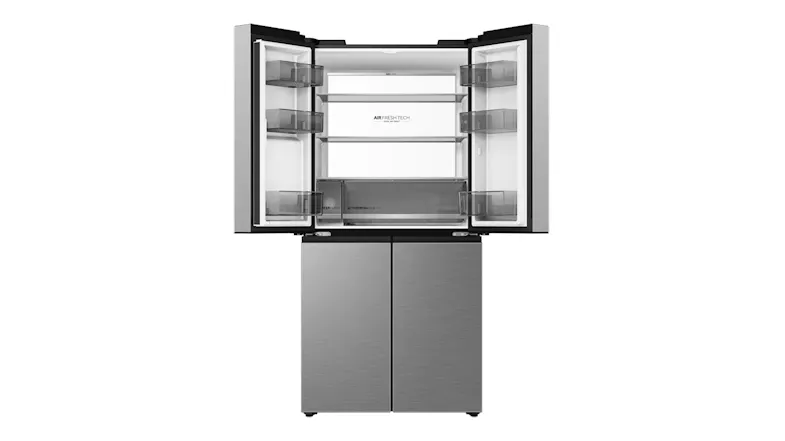 Silver Haier four-door refrigerator with upper doors open, showing empty shelves and the fresh food compartment Silver Haier four-door refrigerator with upper doors open, showing empty shelves and the fresh food compartment