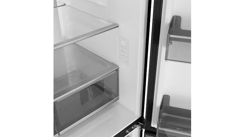 Close-up view of the refrigerator interior featuring glass shelves, digital temperature controls, and a clear storage drawer Close-up view of the refrigerator interior featuring glass shelves, digital temperature controls, and a clear storage drawer