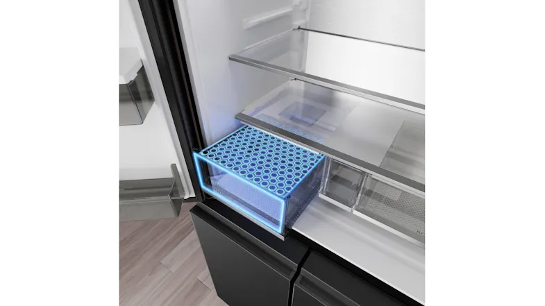 Angled view of a refrigerator crisper drawer with blue freshness-zone illumination and a transparent design Angled view of a refrigerator crisper drawer with blue freshness-zone illumination and a transparent design