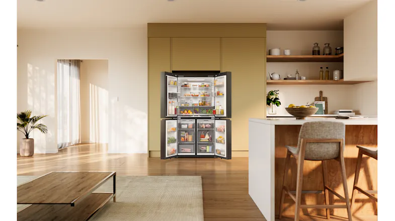 Front view of a Haier 500 Series refrigerator with all doors open, displaying stocked shelves and organised storage drawers Front view of a Haier 500 Series refrigerator with all doors open, displaying stocked shelves and organised storage drawers