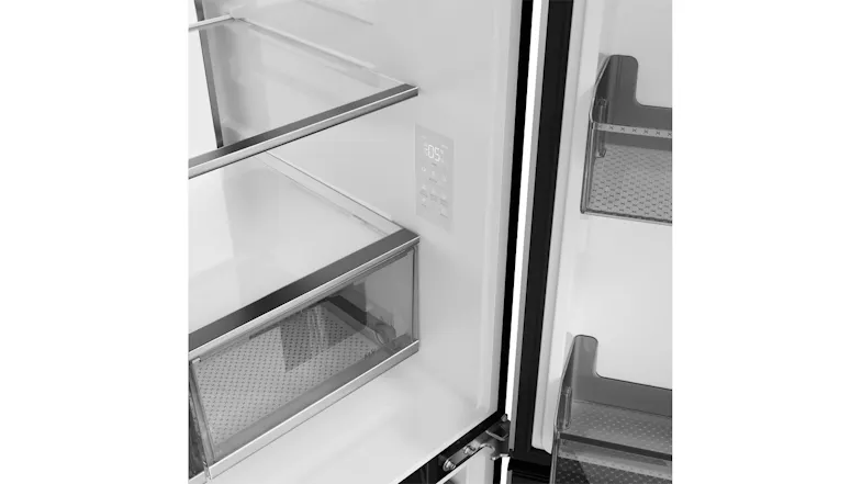 Close-up view of a refrigerator interior with glass shelves, a crisper drawer, and a digital touch control panel Close-up view of a refrigerator interior with glass shelves, a crisper drawer, and a digital touch control panel