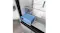 Angled view of a refrigerator fresh zone drawer with a blue cooling effect and glass shelf storage Angled view of a refrigerator fresh zone drawer with a blue cooling effect and glass shelf storage