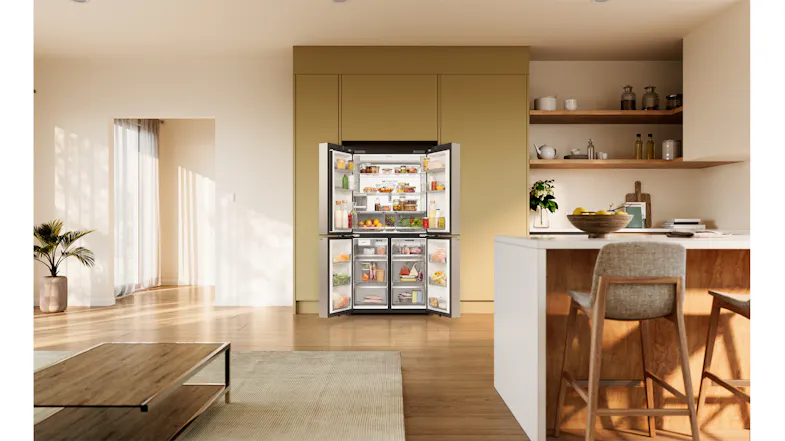Silver quad-door refrigerator with all doors open, displaying organised food storage compartments and shelves Silver quad-door refrigerator with all doors open, displaying organised food storage compartments and shelves