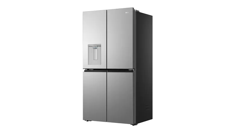 Front-angled view of a silver four-door refrigerator with a water dispenser and dark side panel Front-angled view of a silver four-door refrigerator with a water dispenser and dark side panel