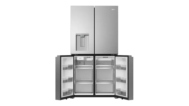 Front view of a silver four-door refrigerator with freezer doors open and multiple drawer compartments visible Front view of a silver four-door refrigerator with freezer doors open and multiple drawer compartments visible