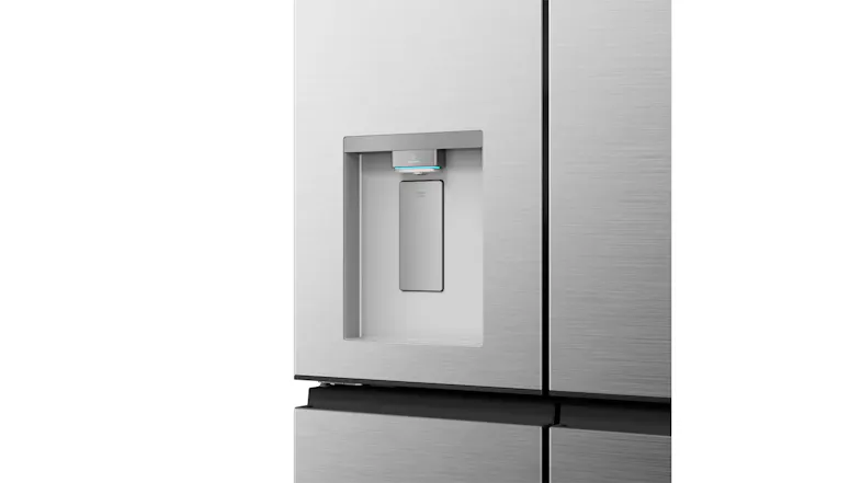 Close-up front view of a silver refrigerator water dispenser with a recessed design and brushed finish Close-up front view of a silver refrigerator water dispenser with a recessed design and brushed finish