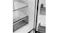 Close-up of a Haier refrigerator interior with a digital temperature control panel and glass shelving Close-up of a Haier refrigerator interior with a digital temperature control panel and glass shelving