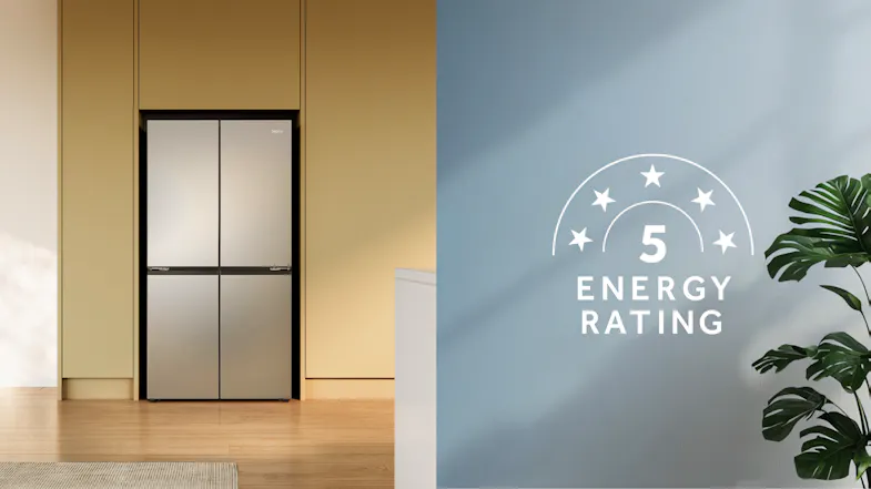 Silver Haier quad-door refrigerator integrated into kitchen cabinetry with a 5-star energy rating graphic Silver Haier quad-door refrigerator integrated into kitchen cabinetry with a 5-star energy rating graphic