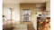 Open silver Haier four-door refrigerator in a modern kitchen, stocked with food and beverages Open silver Haier four-door refrigerator in a modern kitchen, stocked with food and beverages