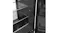 Close-up interior view of a black refrigerator with glass shelves, a storage drawer, and a digital control panel Close-up interior view of a black refrigerator with glass shelves, a storage drawer, and a digital control panel