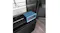 Angled interior view of a refrigerator freshness drawer with blue illumination, glass shelves, and digital controls Angled interior view of a refrigerator freshness drawer with blue illumination, glass shelves, and digital controls