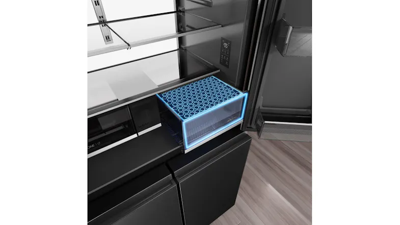 Angled interior view of a refrigerator freshness drawer with blue illumination, glass shelves, and digital controls Angled interior view of a refrigerator freshness drawer with blue illumination, glass shelves, and digital controls