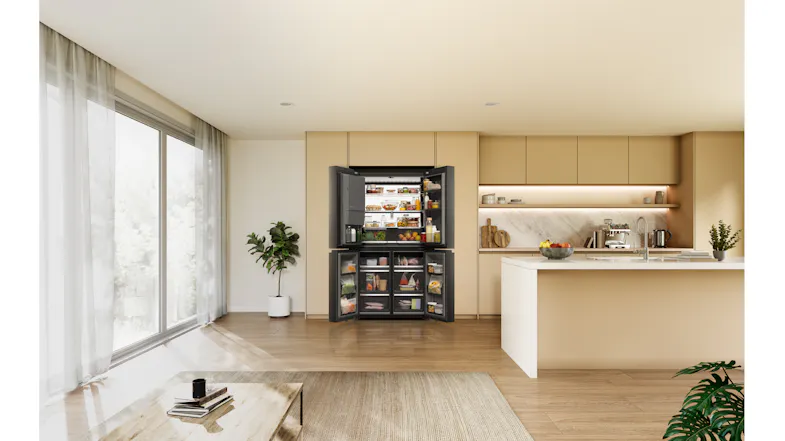 Wide-angle view of a black quad-door refrigerator with its doors open, showing organised fresh and frozen food storage Wide-angle view of a black quad-door refrigerator with its doors open, showing organised fresh and frozen food storage